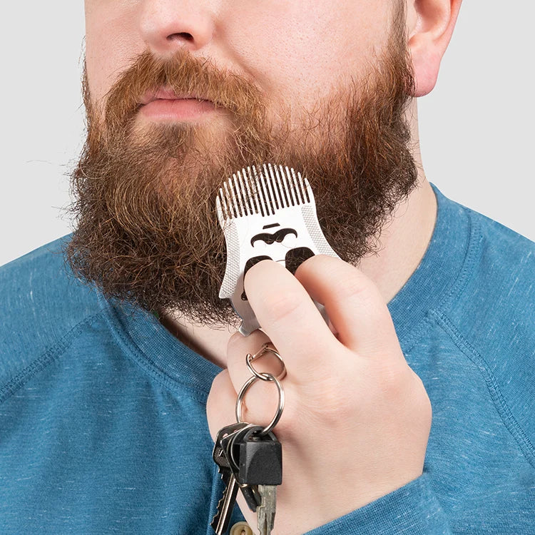 Beard comb tool shown attached to a keyring.