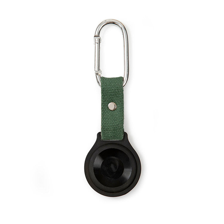 Black silicone AirTag holder with olive green canvas strap and silver carabiner clip, hanging vertically.