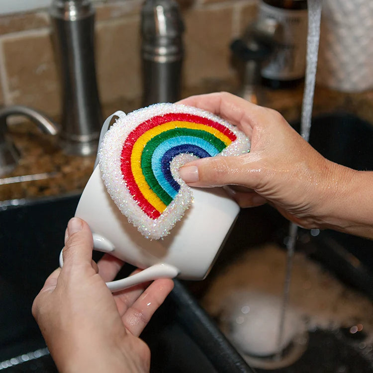 Rainbow scrub sponge set shown from above on white background.