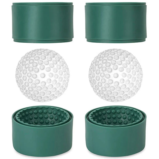 Green silicone golf ball ice molds with two clear dimpled ice balls resting on the open mold halves.