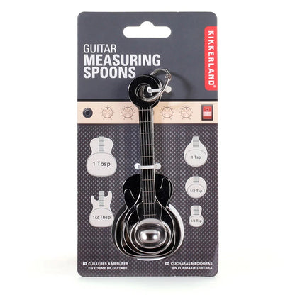 Close-up of guitar measuring spoon detail including string-like markings.