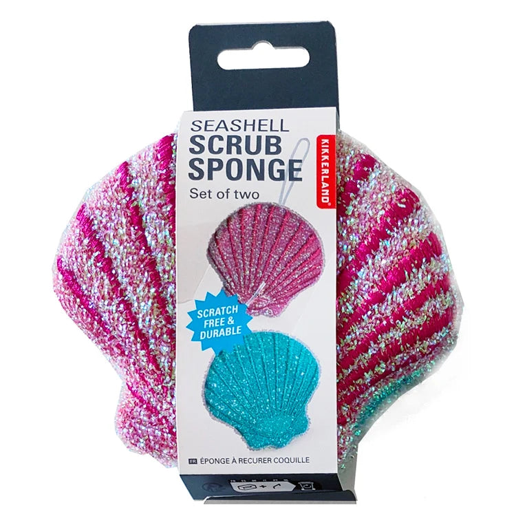 Close-up of seashell-shaped scrubbing sponge with nylon hanging string.