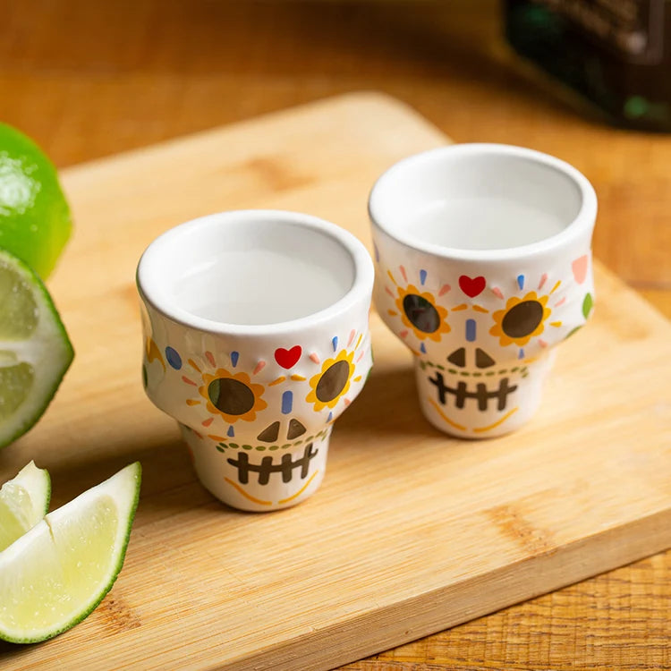 Sugar skull shot glass set shown from above.