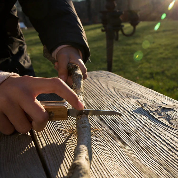 Huckleberry pocket knife folded closed with keyring attached.