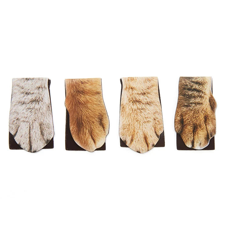 Four magnetic cat paw bookmarks in faux fur textures — grey, orange, tan and brown — arranged in a row.