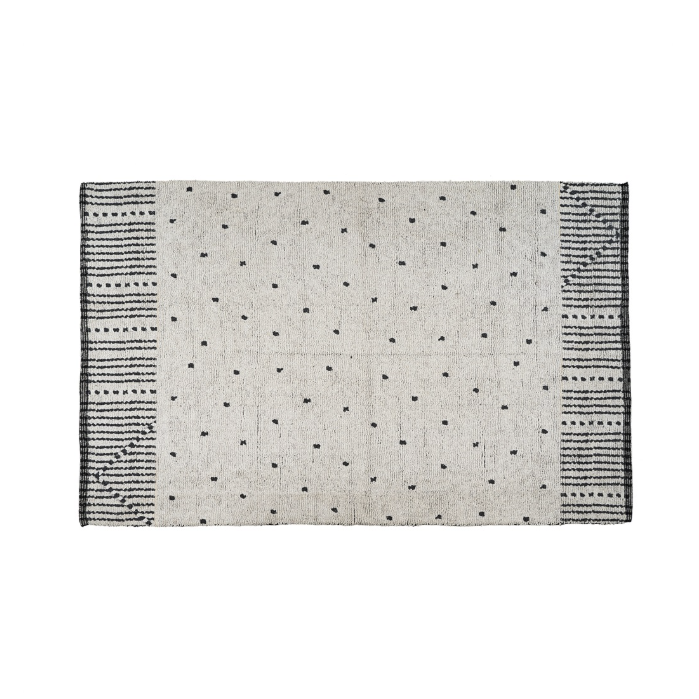 Cream rug with a scattered black dot pattern and striped woven borders