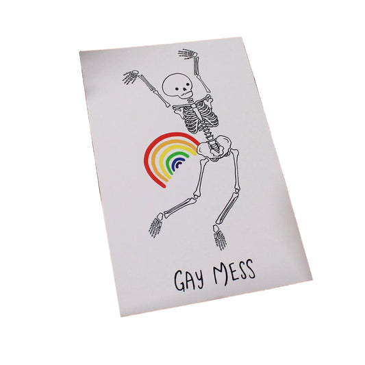 Hand-drawn illustrated print of a dancing skeleton with a small rainbow near its hip and the hand-lettered words Gay Mess below, on cream cardstock