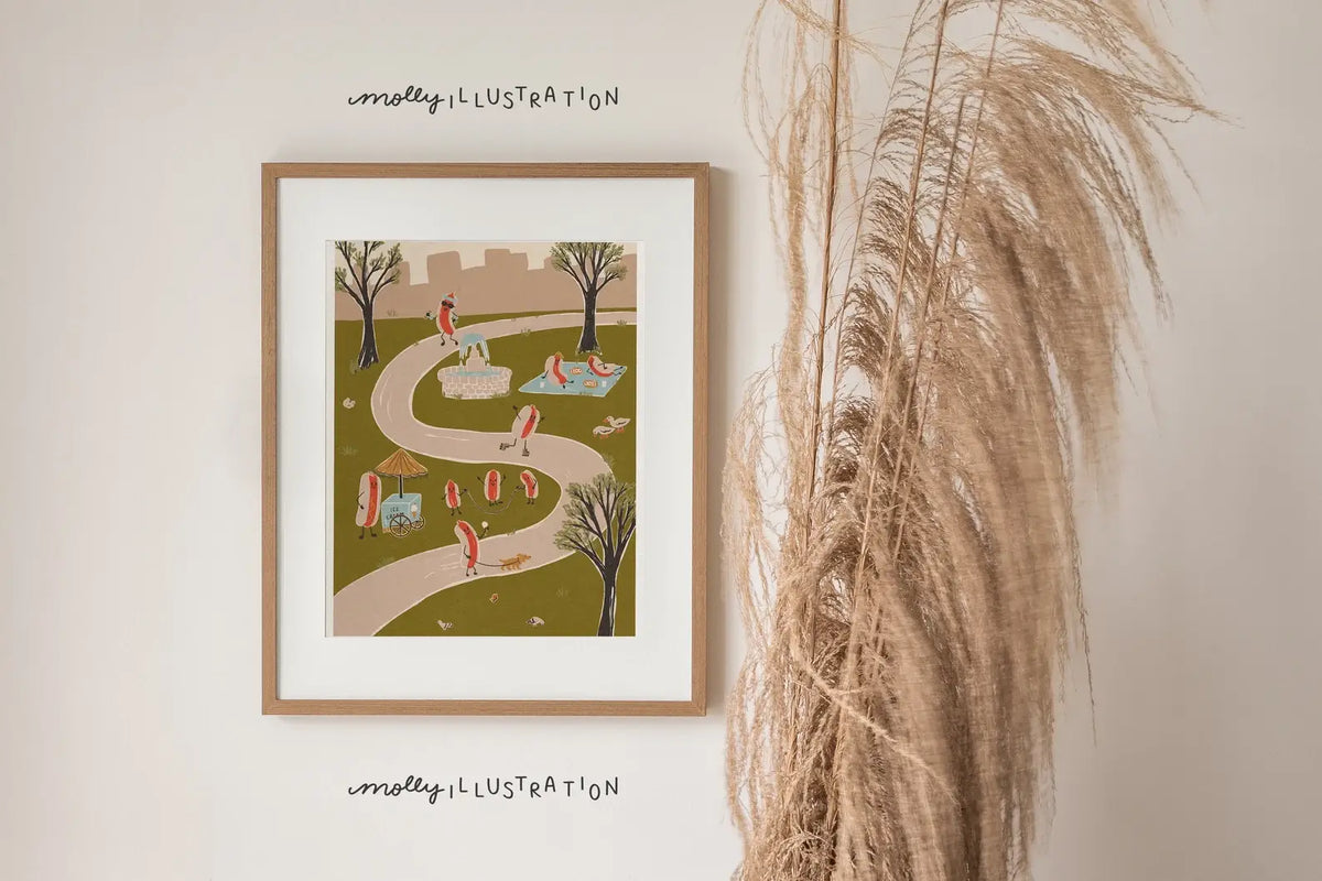 Framed Hot Dog! Summer in the City art print displayed on a shelf styled with dried pampas grass