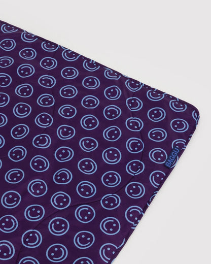 BAGGU Puffy Picnic Blanket Indigo Happy unrolled corner detail - PABOOM