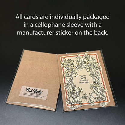 Well Sheeyit card packaged in a cellophane sleeve