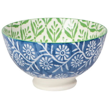 White porcelain bowl with a green rim and interior featuring a stamped radiating leaf pattern – PABOOM