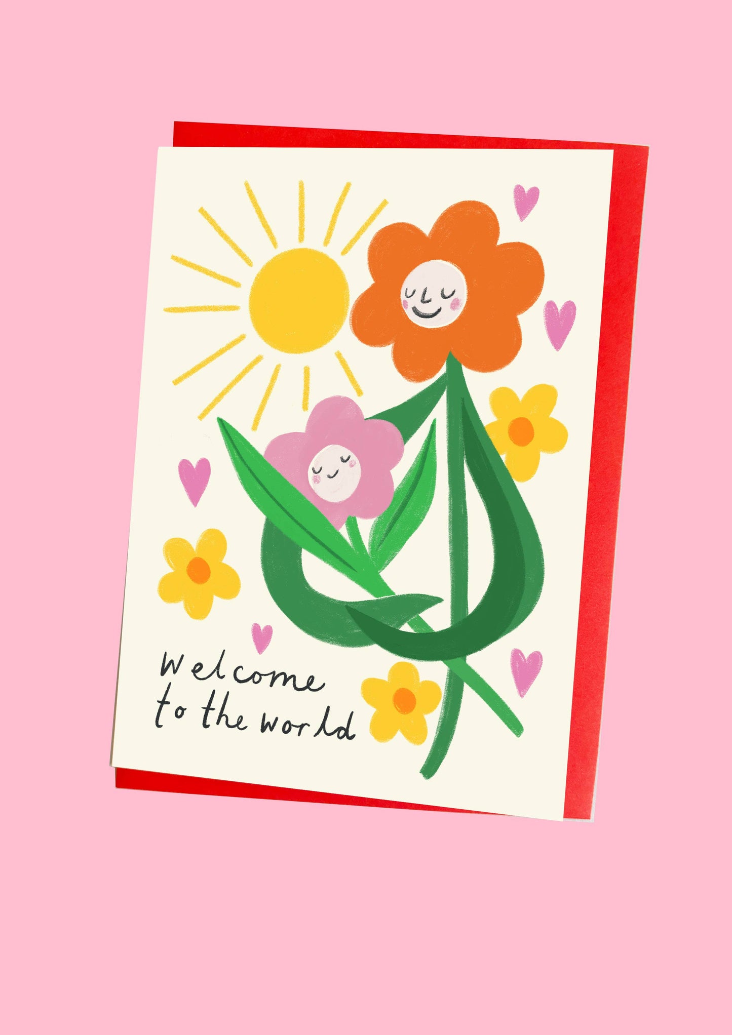 Kitty Kenda new baby card illustrating a smiling sun and two smiling flower faces with "Welcome to the World" text