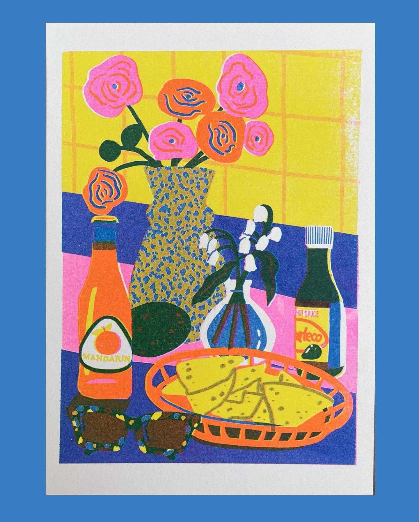 Risograph print of a still life with roses, a bottle of Mandarin soda, hot sauce and a basket of chips on a yellow and blue background - PABOOM