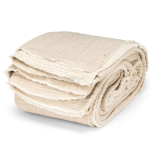 Rolled beige Kantha bed cover showing layered stonewashed cotton and stitched texture, 90x90 - PABOOM