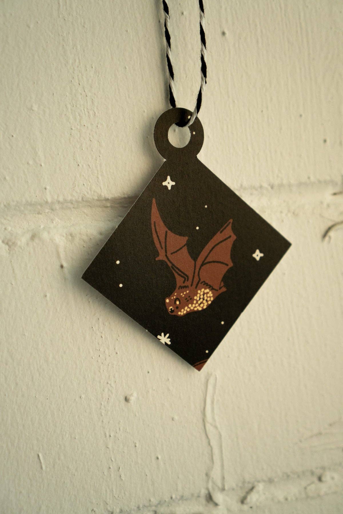 Spooky Season's Greetings card, ornament punched out and strung with twine