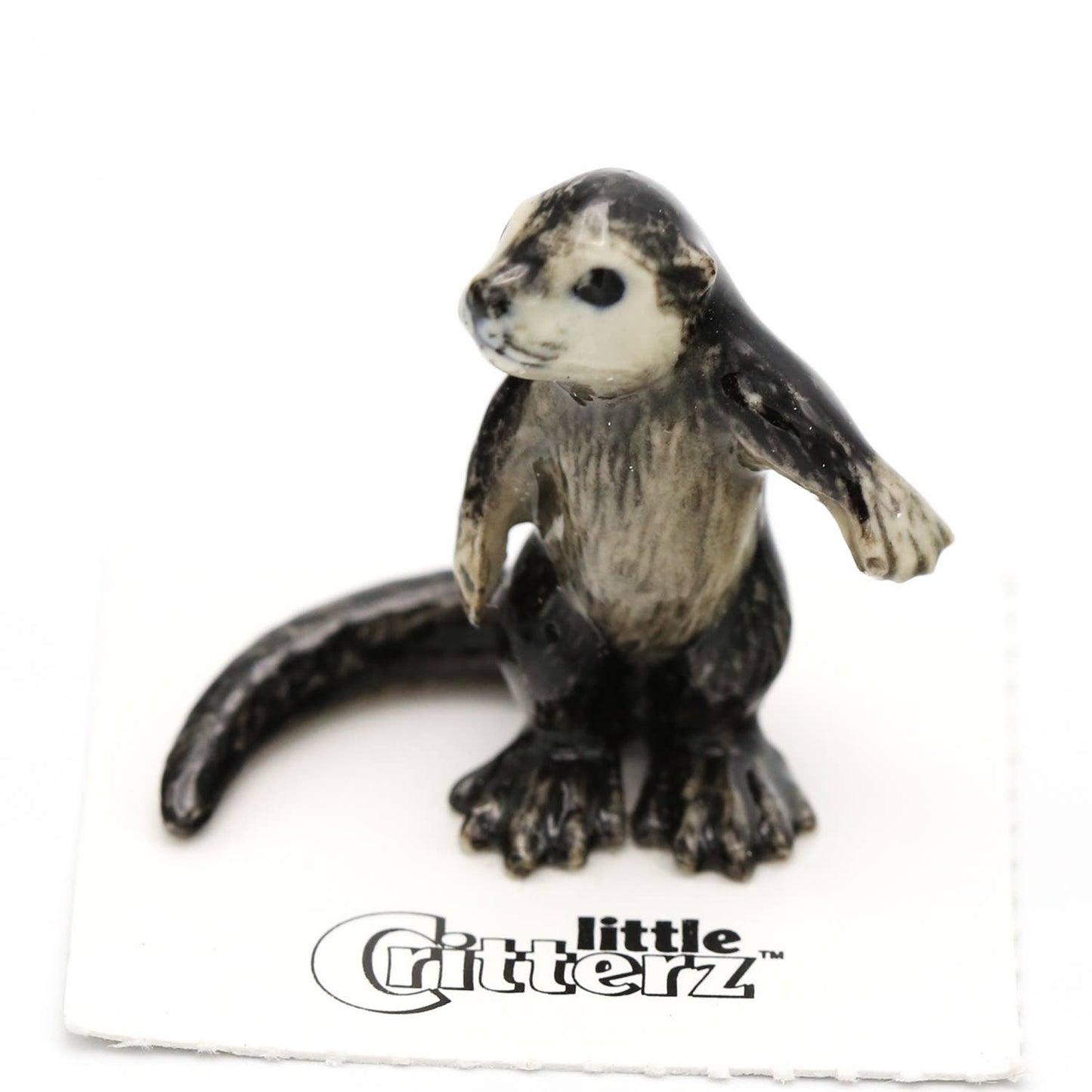 Slide River Otter Decorative Figurine in Porcelain Miniature