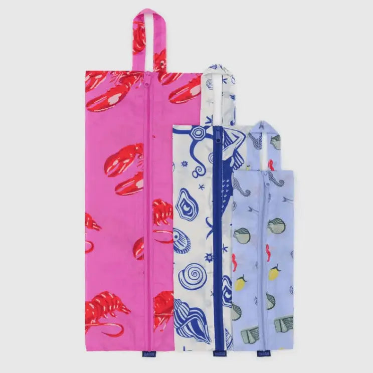 Flat lay of BAGGU 3D Zip Set Sea Creatures pouches showing size comparison of large, medium, and small pouches - PABOOM