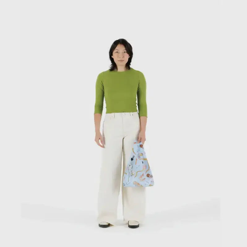 Baby Baggu bag featuring a pattern of beauty products being held in the hand - PABOOM