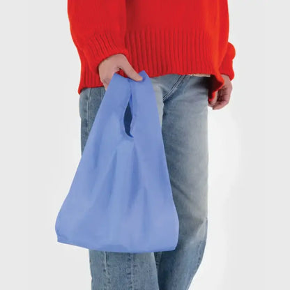 Pale blue Baby Baggu bag beind held in the hand  - PABOOM