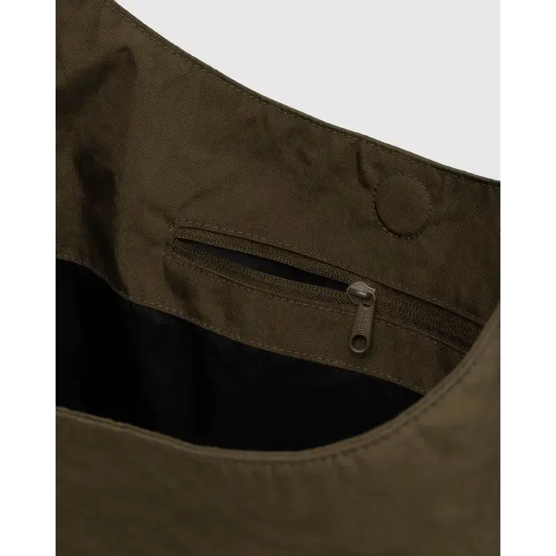 Interior zip pocket and magnetic snap on BAGGU Large Nylon Sling in Seaweed - PABOOM