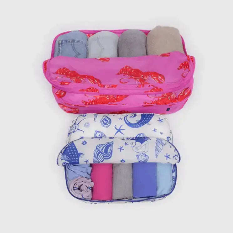 BAGGU packing cubes open and packed with rolled clothes - PABOOM