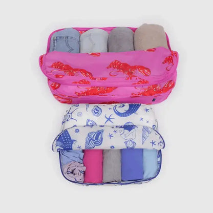 BAGGU packing cubes open and packed with rolled clothes - PABOOM