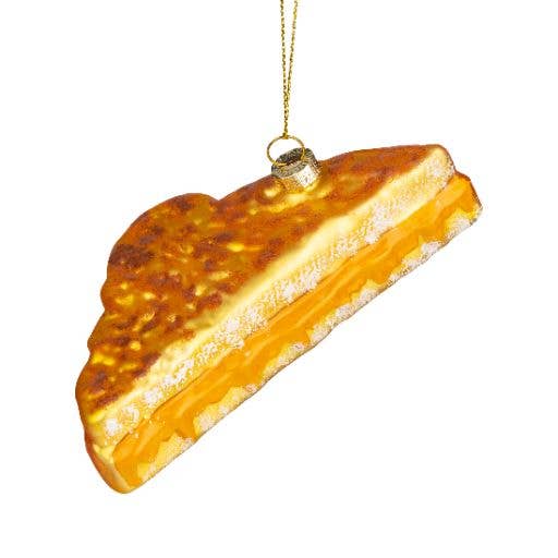 Glass ornament shaped like a grilled cheese sandwich with melted cheese detail - PABOOM