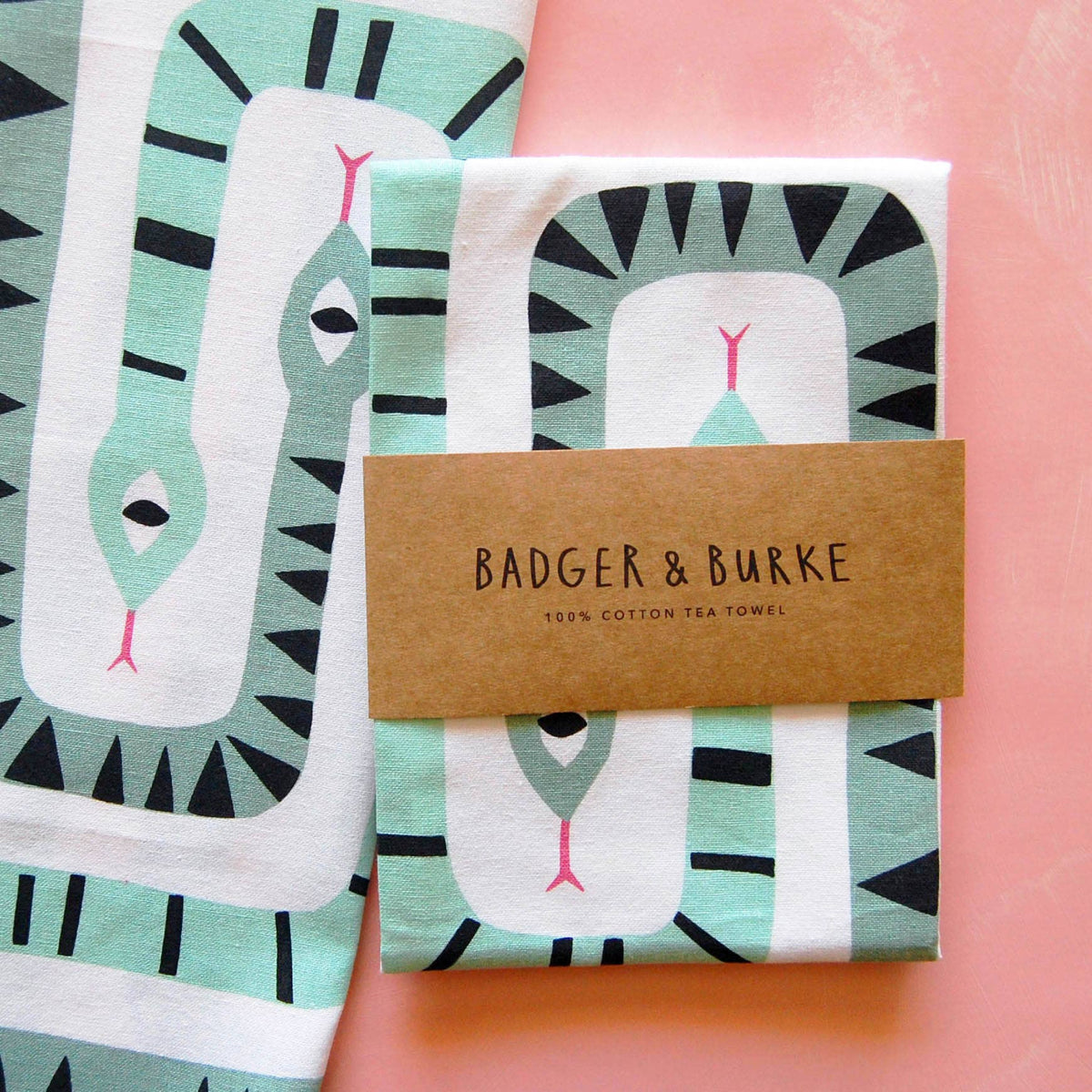 Twin Snake tea towel hanging in a kitchen - PABOOM