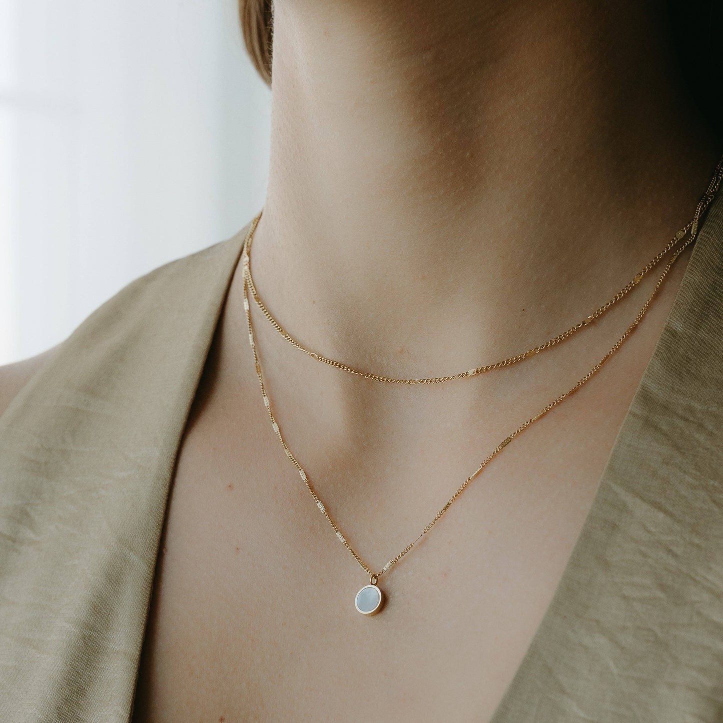 Liora layered gold necklace pendant close-up - PABOOM