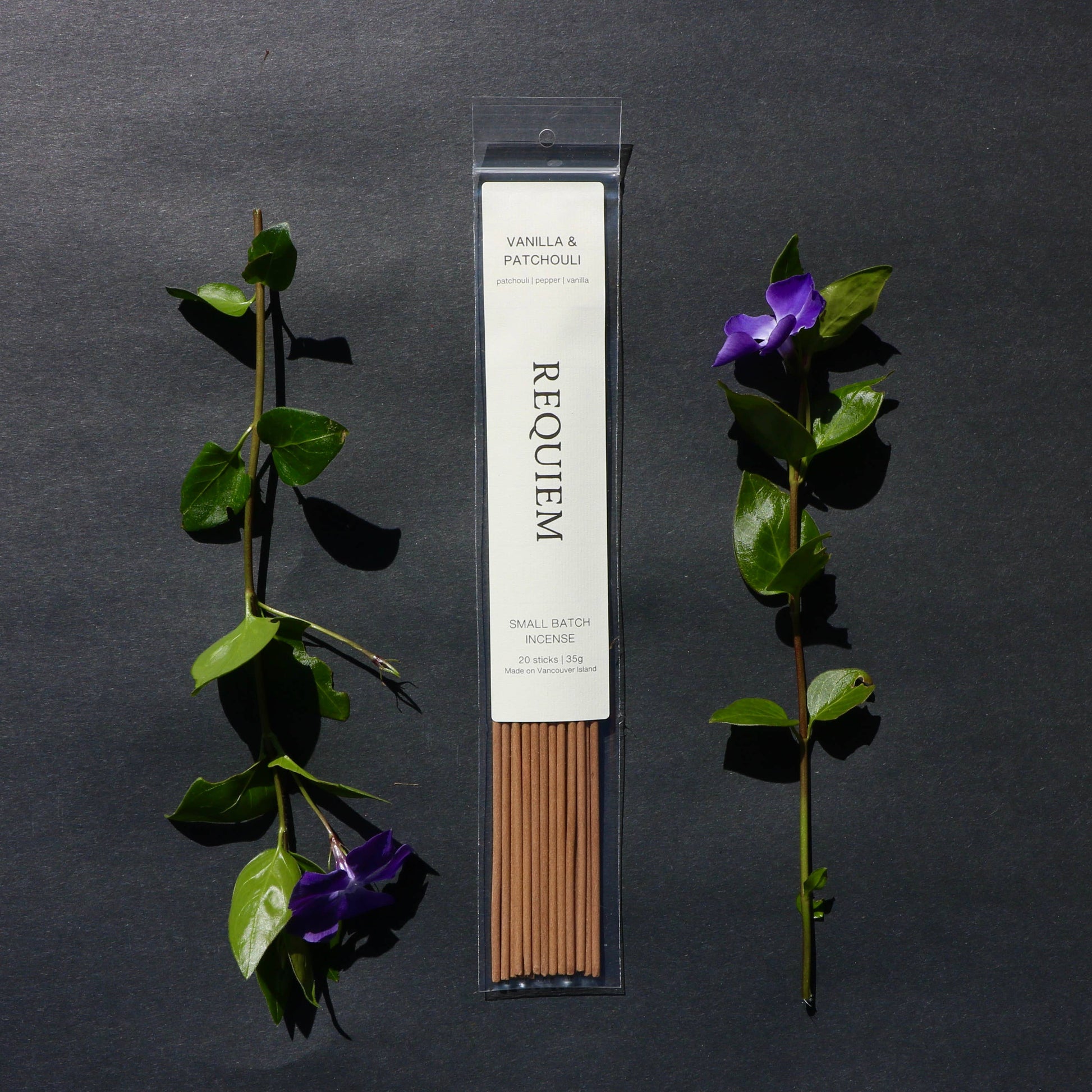 Requiem incense sticks with packaging on a dark background