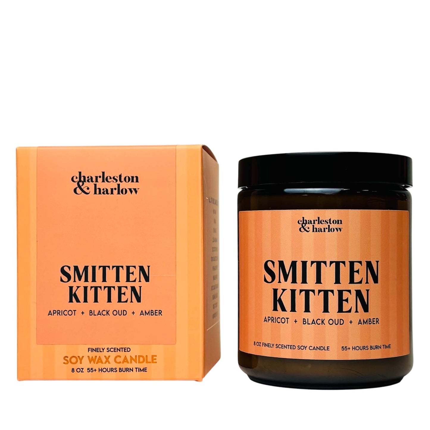 Charleston & Harlow Smitten Kitten soy candle in amber glass jar with peach striped label, beside its matching gift box