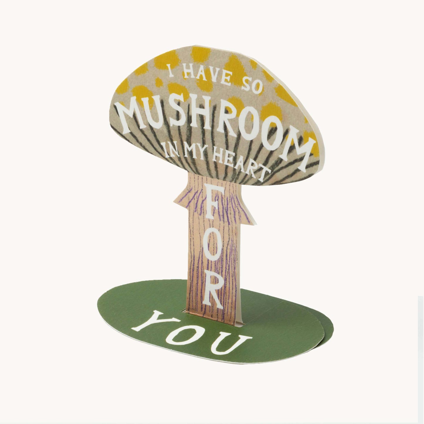 Free-standing yellow-spotted mushroom card reading 'I Have So Mushroom in My Heart For You,' on a green oval base