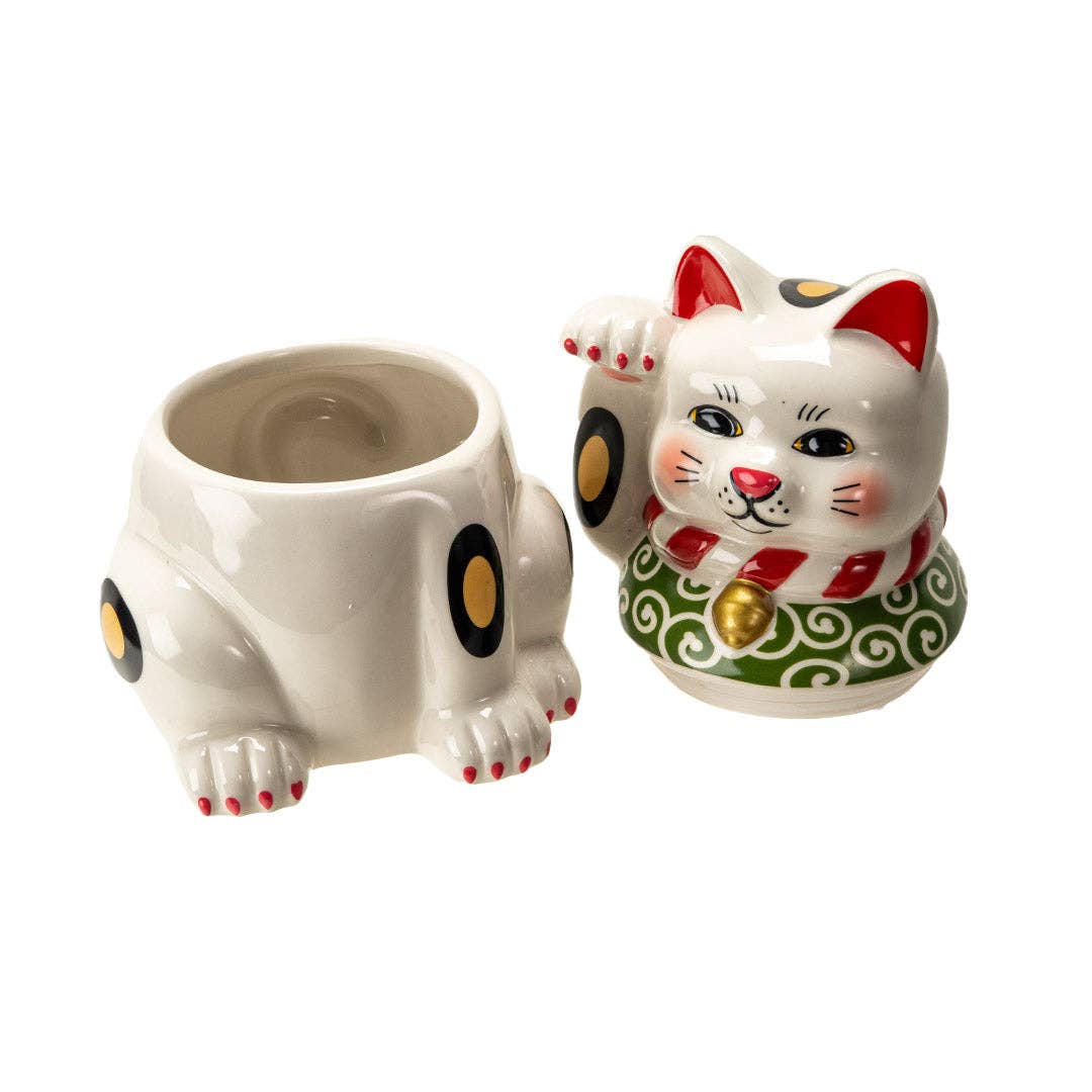 Maneki Neko cookie jar shown at an angle highlighting the raised waving paw