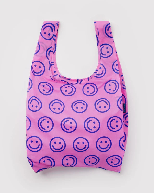 BAGGU Standard Baggu reusable bag in Pop Pink Happy print folded flat - PABOOM