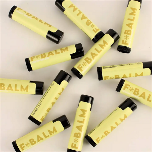 Charleston & Harlow Candle Co. - Lemon Gelato Lip Balm - numerous yellow lip balm tubes