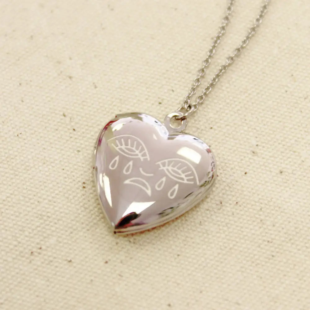 Cousins Collective - Crying Heart Locket Charm Necklace Silver