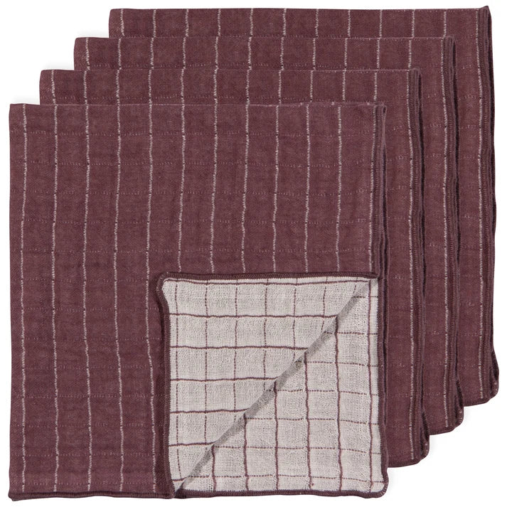Two folded plum-coloured cotton napkins with a soft double-weave texture – PABOOM