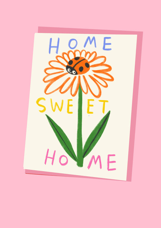 Kitty Kenda new home card featuring a hand-drawn orange daisy with a ladybird and "Home Sweet Home" lettering