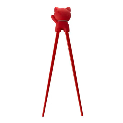 Red maneki-neko training chopsticks in hand - PABOOM