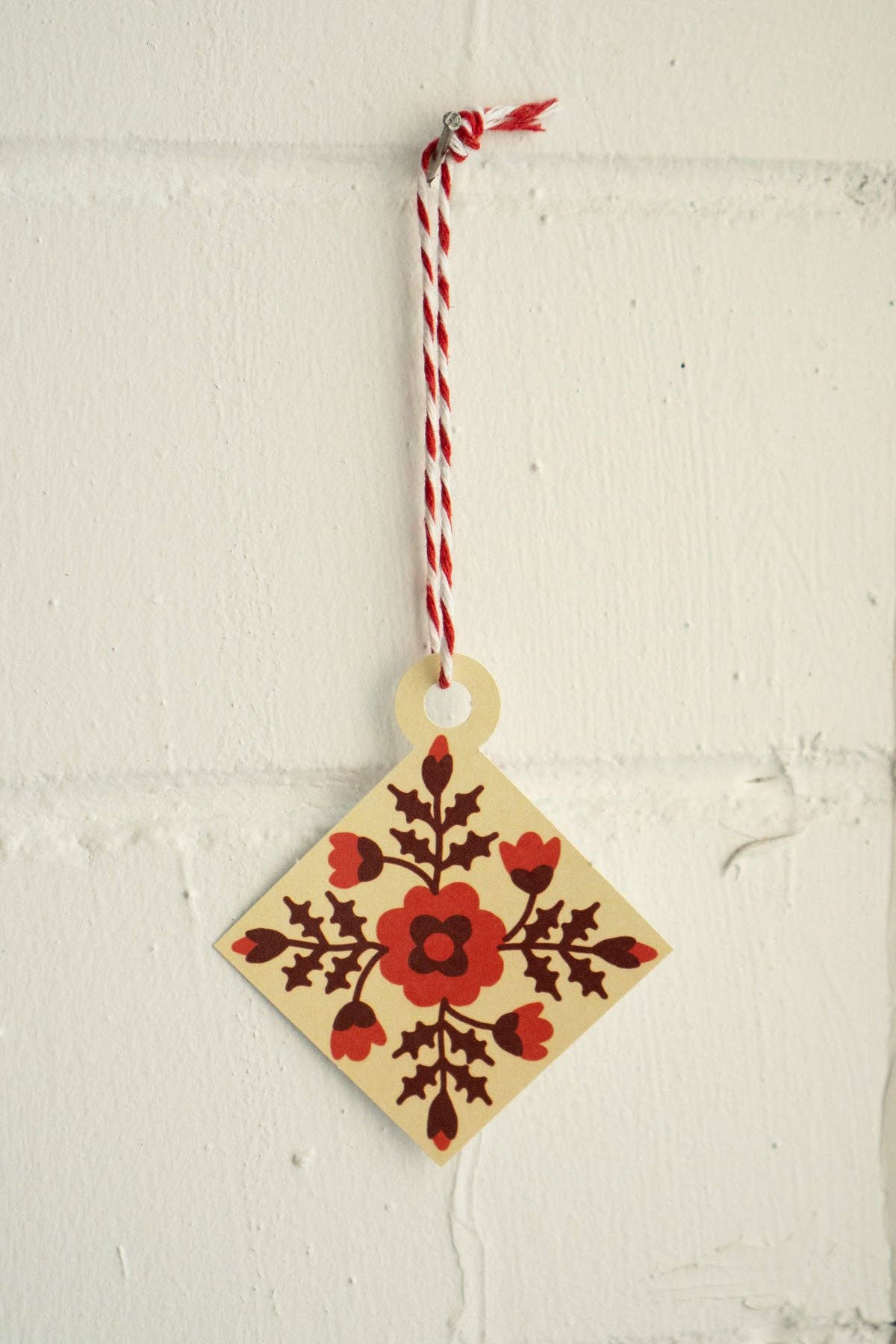 Holiday Quilt Block card, ornament punched out and strung with twine