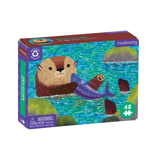 Sea Otter 48 piece mini puzzle box with an otter holding a fish in blue water - PABOOM