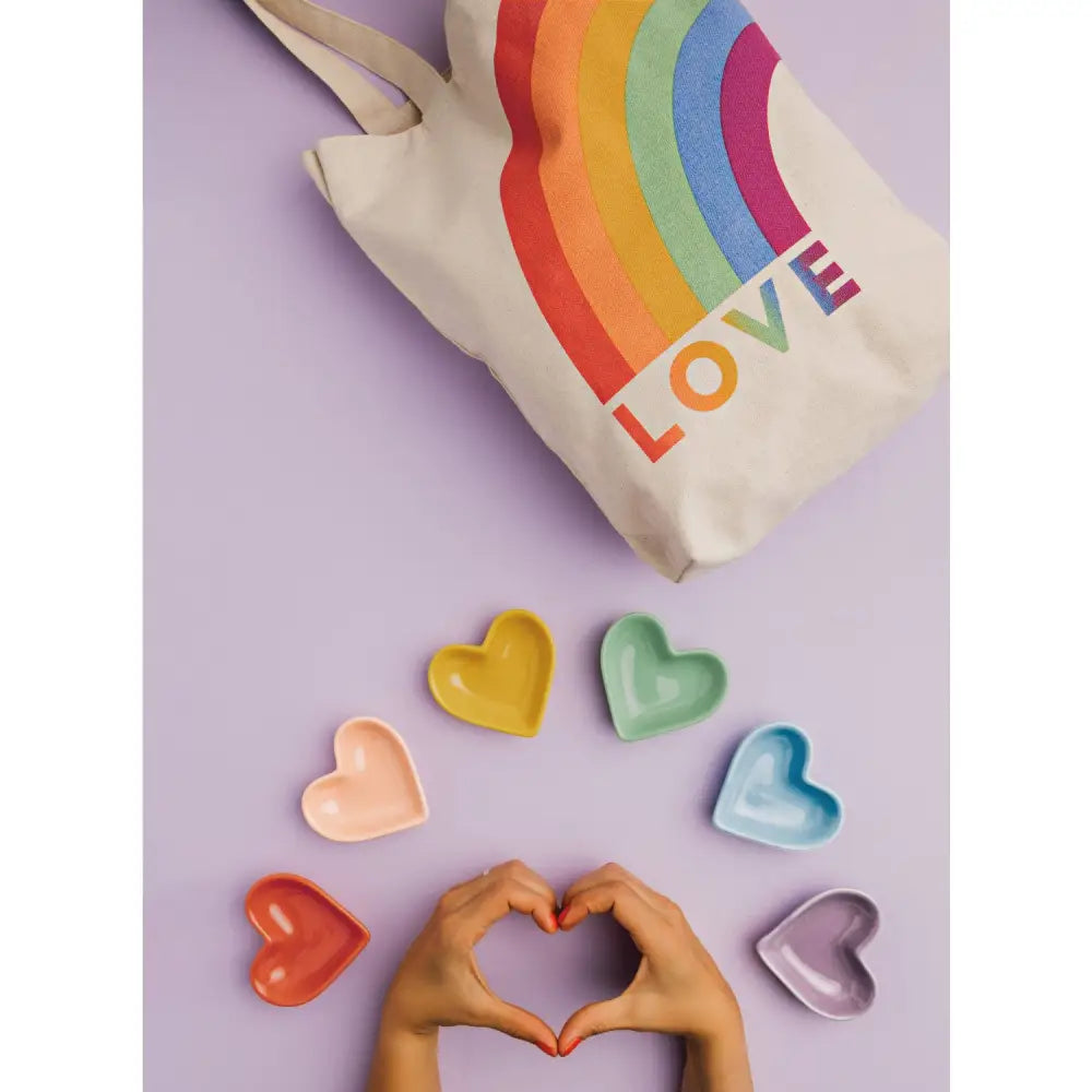 heart shaped colourful bowls with two hands creating a heart shape and a canvas tote bag with a rainbow and "LOVE" - PABOOM