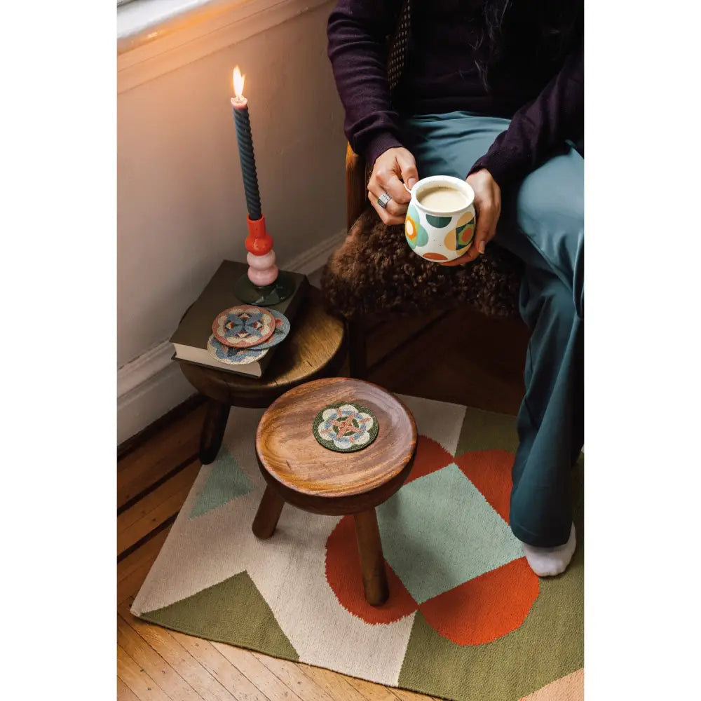 Danica - cozy interior scene colorful rug