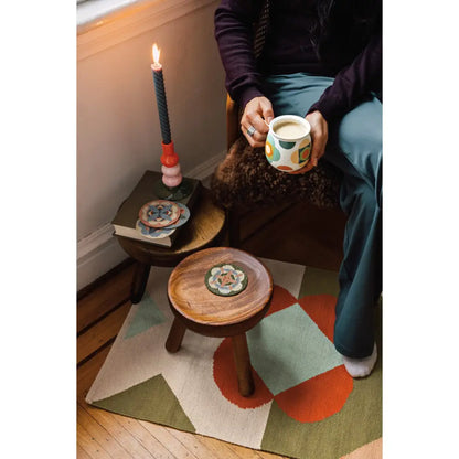 Danica - cozy interior scene colorful rug