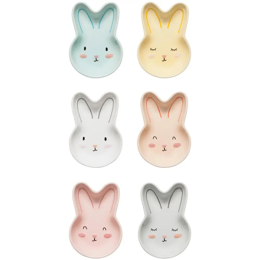 6 assorted bunny face small bowls on white background