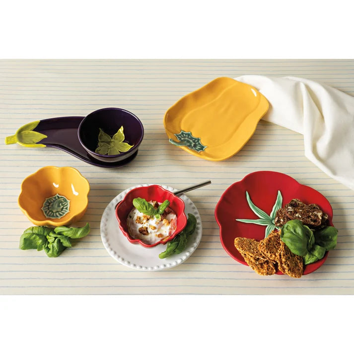 Eggplant shaped dish styled on a table with snacks – PABOOM