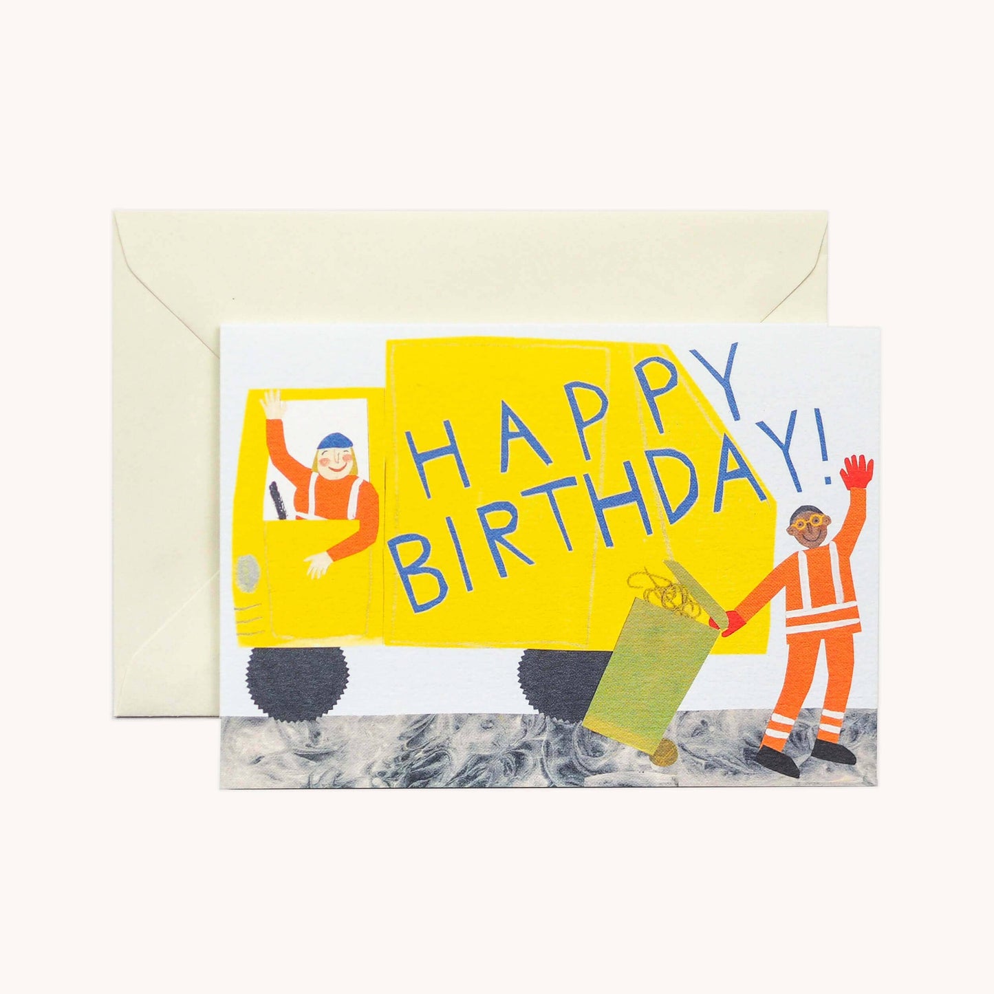 White greeting card with an illustrated yellow bin lorry and two waving workers, the truck's side reading 'Happy Birthday!,' ivory envelope alongside