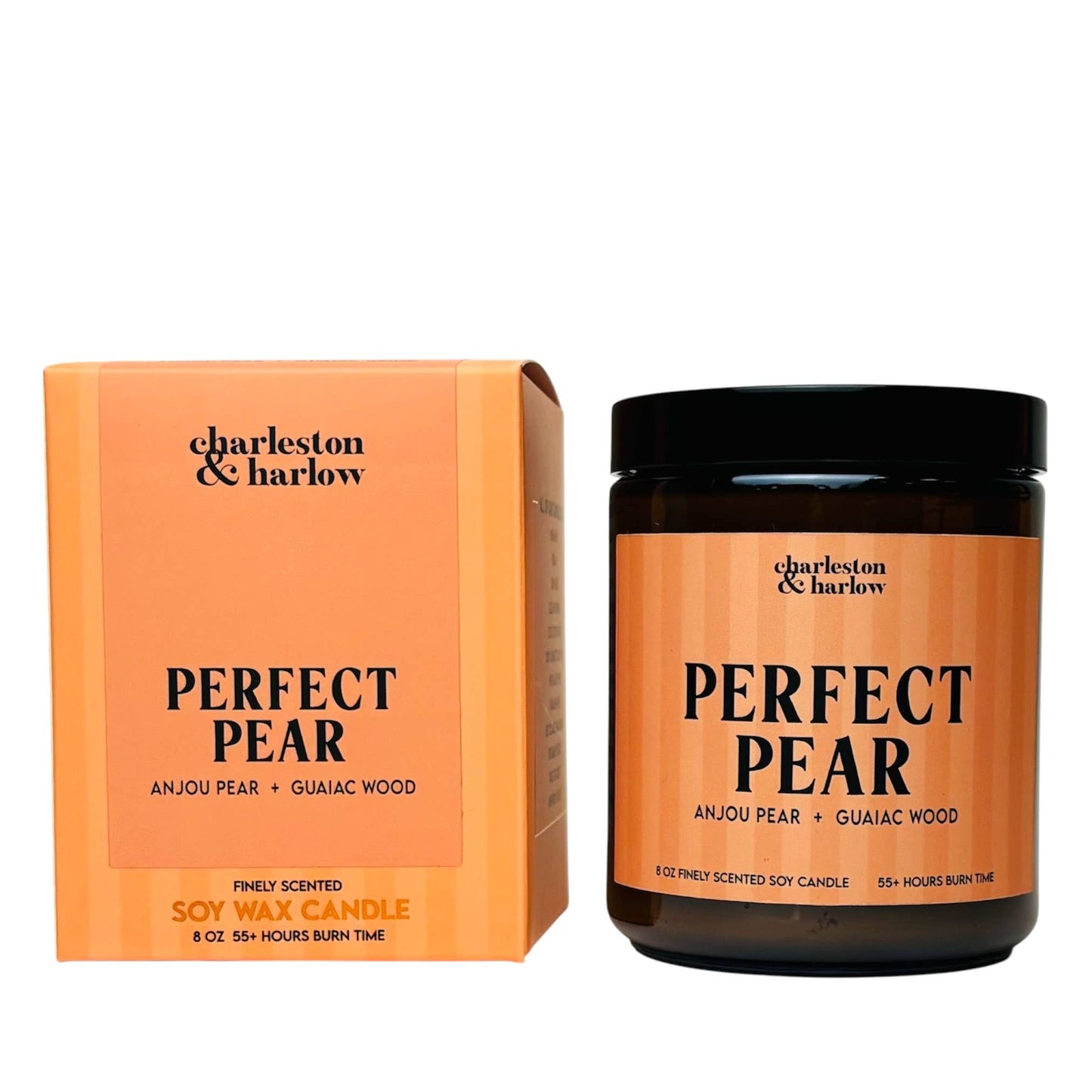 Charleston & Harlow Perfect Pear soy candle in amber glass jar with orange striped label, beside its matching gift box