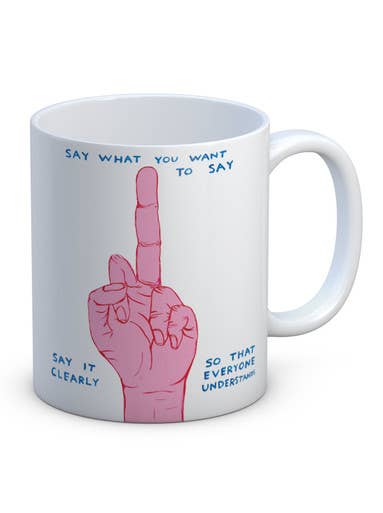 David Shrigley white ceramic mug illustrated with a pink hand giving the middle finger, captioned "Say What You Want to Say" - PABOOM
