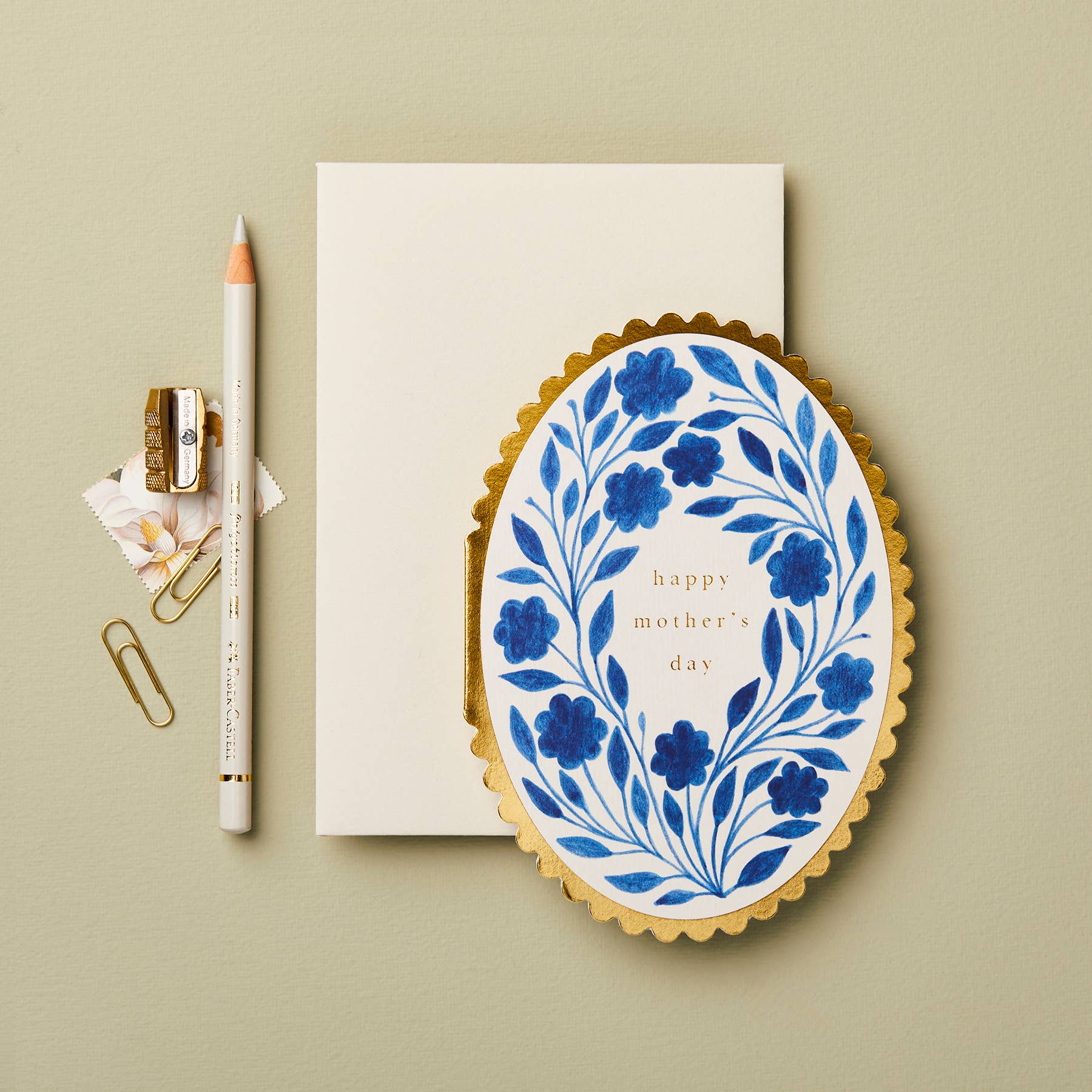 Delft Flora Mother's Day cards shown stacked, styled with ribbon